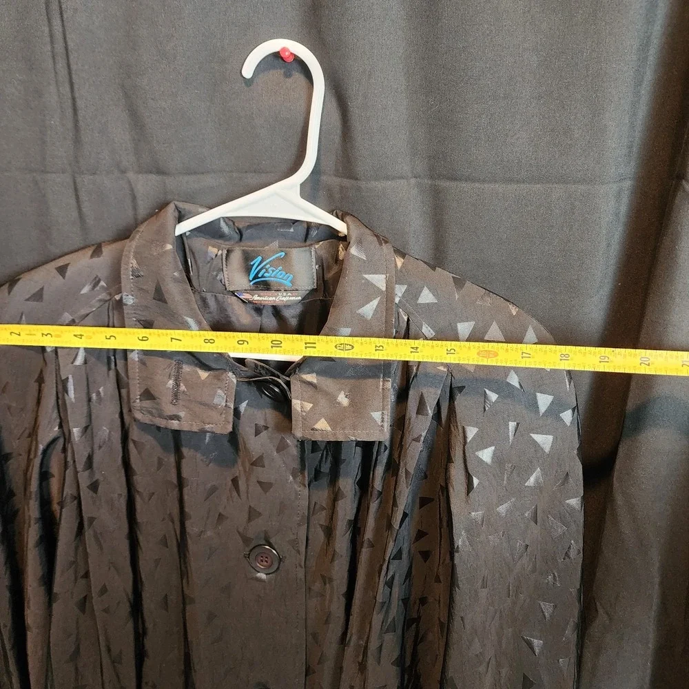 Vision brand black trench coat with a geometric triangle‎ pattern See Photos For